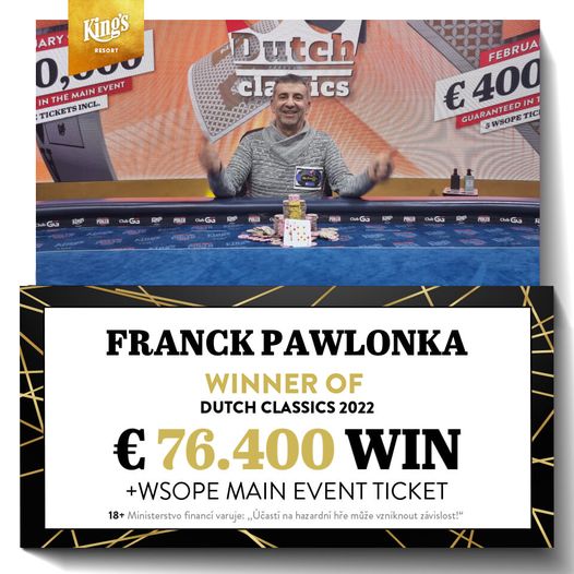 Franck Pawlonka Dutch Classics Winner - gracz pozuje ze zwycięską ręką po wygranej